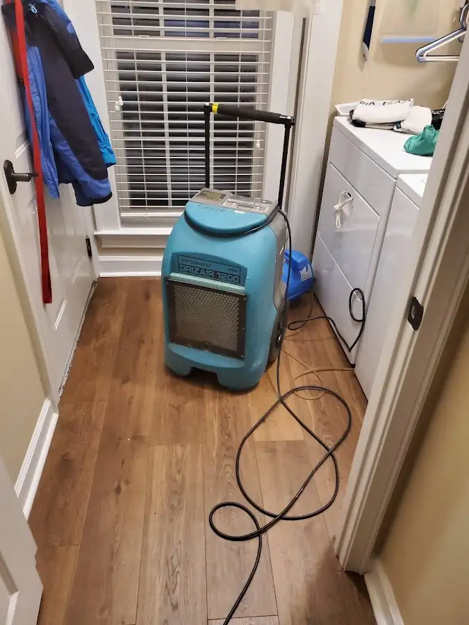 Commercial dehumidifier deployed for Flood Damage Cleanup in Kings Park West